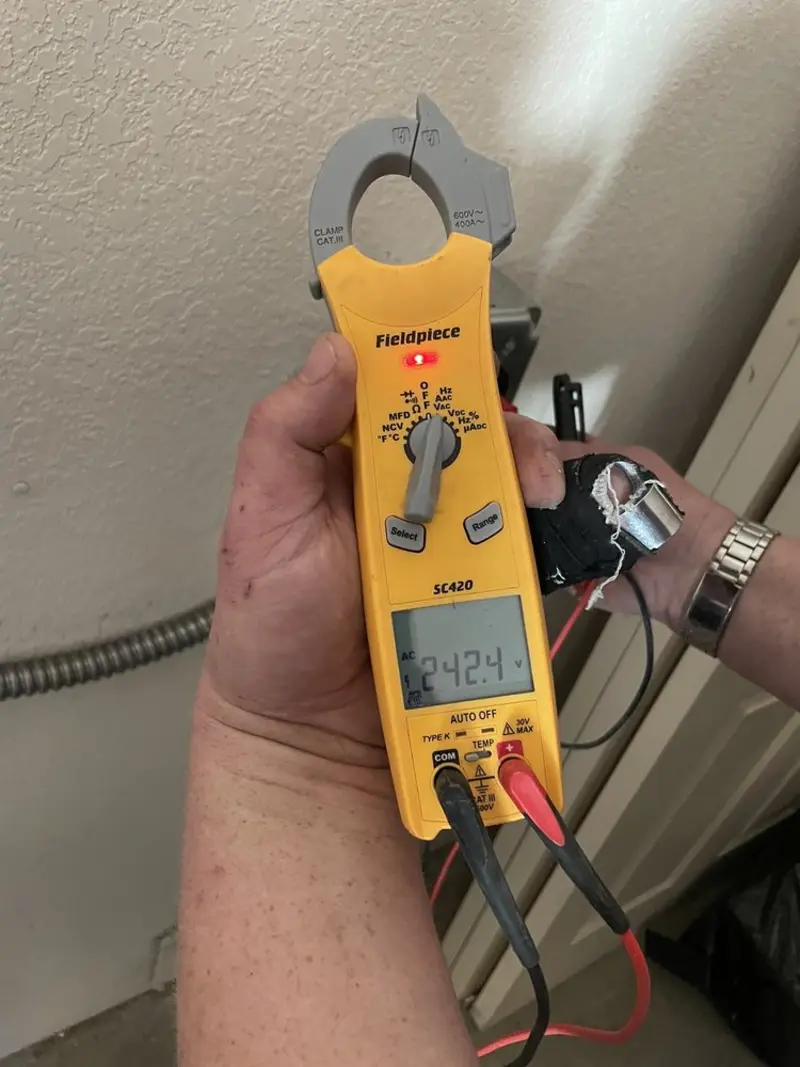 Voltage testing with clamp meter during Recessed Lighting Installation in Sloatsburg